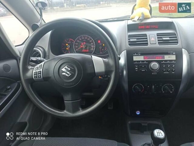 Серый Сузуки СХ4, объемом двигателя 1.56 л и пробегом 230 тыс. км за 6300 $, фото 5 на Automoto.ua