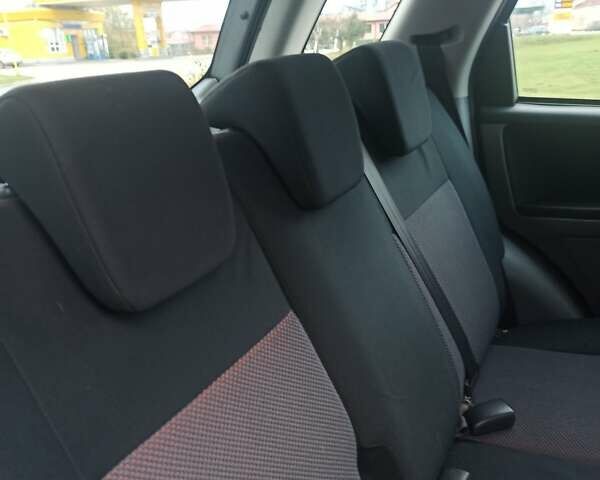 Серый Сузуки СХ4, объемом двигателя 1.56 л и пробегом 230 тыс. км за 6300 $, фото 7 на Automoto.ua