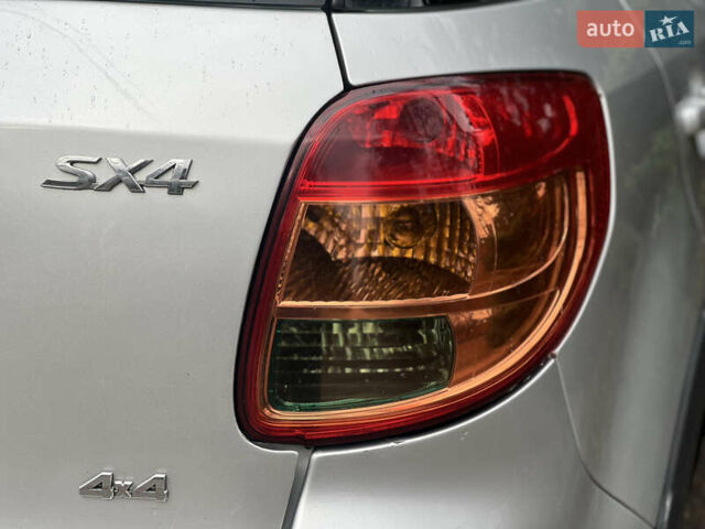 Серый Сузуки СХ4, объемом двигателя 1.59 л и пробегом 209 тыс. км за 5150 $, фото 10 на Automoto.ua