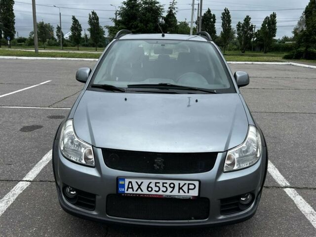 Серый Сузуки СХ4, объемом двигателя 1.6 л и пробегом 200 тыс. км за 4000 $, фото 1 на Automoto.ua