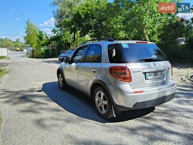 Серый Сузуки СХ4, объемом двигателя 1.6 л и пробегом 233 тыс. км за 5400 $, фото 3 на Automoto.ua