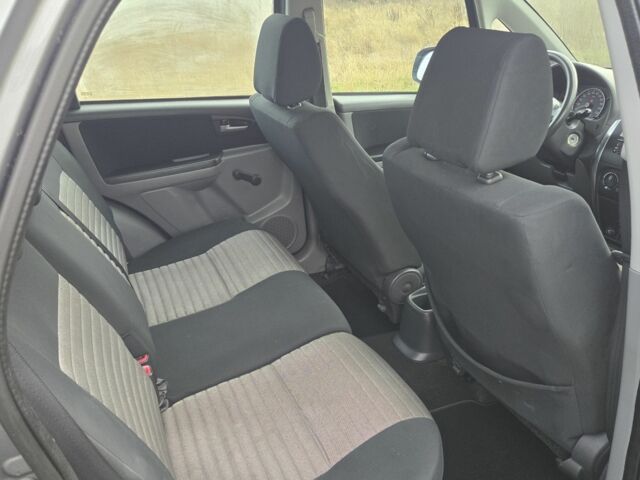 Серый Сузуки СХ4, объемом двигателя 1.6 л и пробегом 175 тыс. км за 5800 $, фото 5 на Automoto.ua