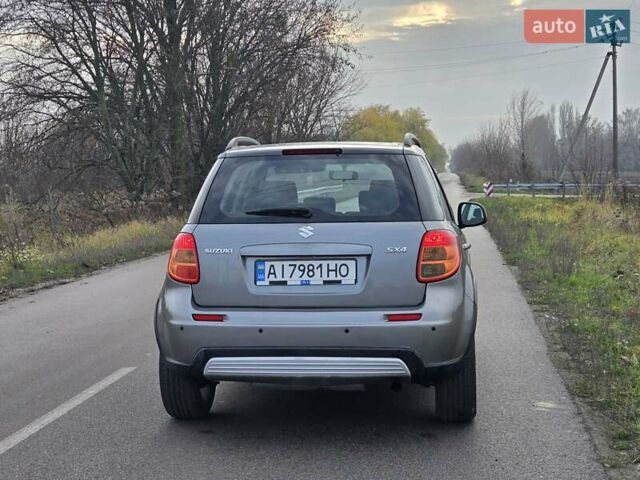 Серый Сузуки СХ4, объемом двигателя 1.6 л и пробегом 175 тыс. км за 5800 $, фото 6 на Automoto.ua