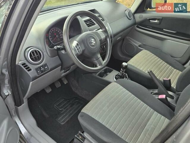 Серый Сузуки СХ4, объемом двигателя 1.6 л и пробегом 175 тыс. км за 5800 $, фото 16 на Automoto.ua