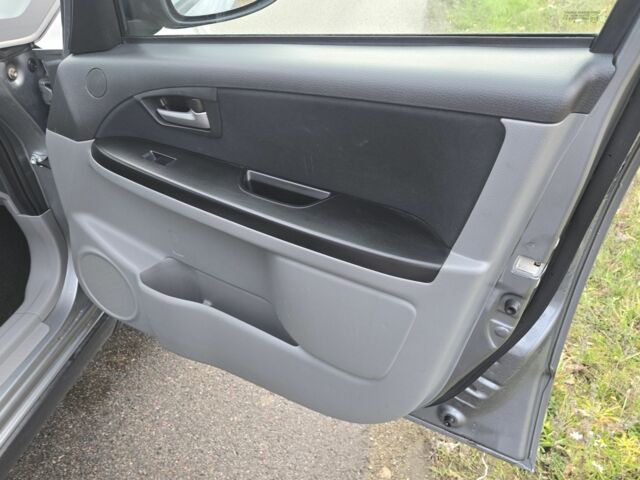 Серый Сузуки СХ4, объемом двигателя 1.6 л и пробегом 175 тыс. км за 5800 $, фото 6 на Automoto.ua