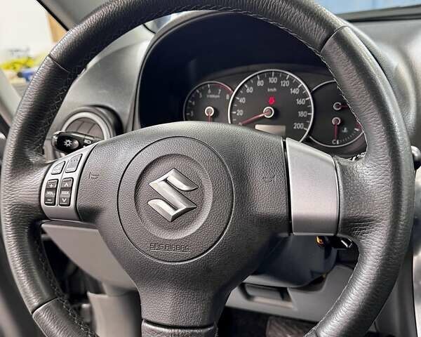 Серый Сузуки СХ4, объемом двигателя 1.6 л и пробегом 133 тыс. км за 7999 $, фото 99 на Automoto.ua