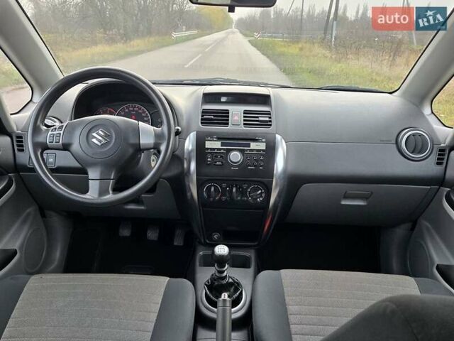 Серый Сузуки СХ4, объемом двигателя 1.6 л и пробегом 175 тыс. км за 5800 $, фото 17 на Automoto.ua