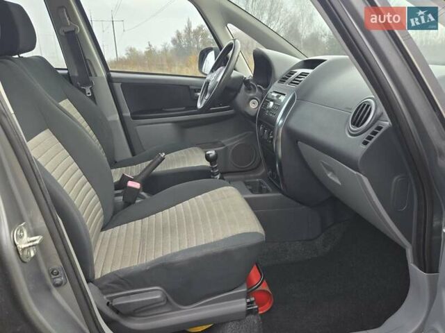 Серый Сузуки СХ4, объемом двигателя 1.6 л и пробегом 175 тыс. км за 5800 $, фото 12 на Automoto.ua