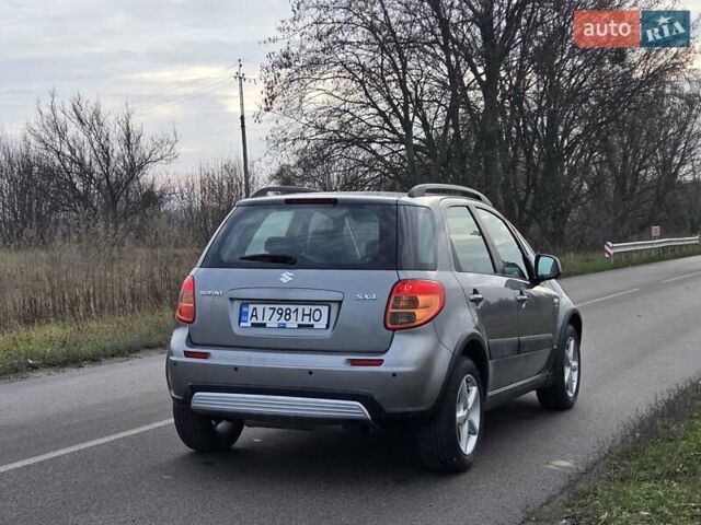 Серый Сузуки СХ4, объемом двигателя 1.6 л и пробегом 175 тыс. км за 5800 $, фото 7 на Automoto.ua