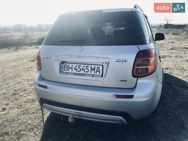 Серый Сузуки СХ4, объемом двигателя 1.59 л и пробегом 220 тыс. км за 5900 $, фото 1 на Automoto.ua