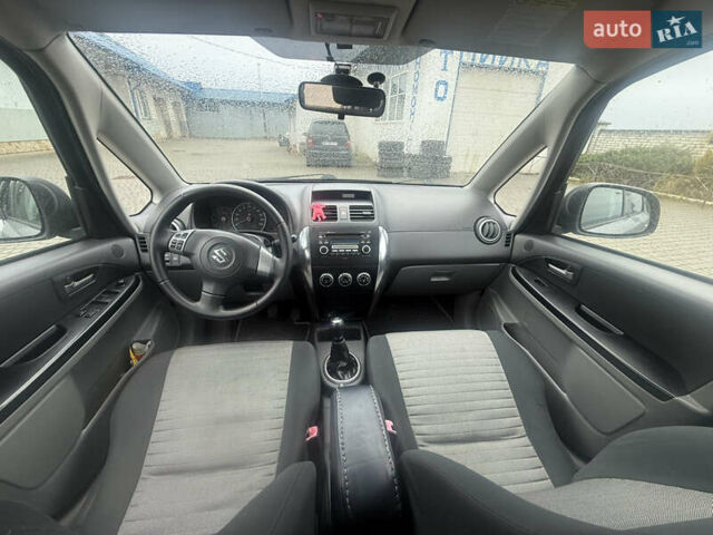Сірий Сузукі СХ4, об'ємом двигуна 1.59 л та пробігом 280 тис. км за 4999 $, фото 8 на Automoto.ua