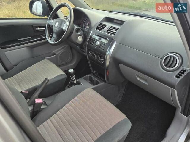 Серый Сузуки СХ4, объемом двигателя 1.6 л и пробегом 175 тыс. км за 5800 $, фото 9 на Automoto.ua