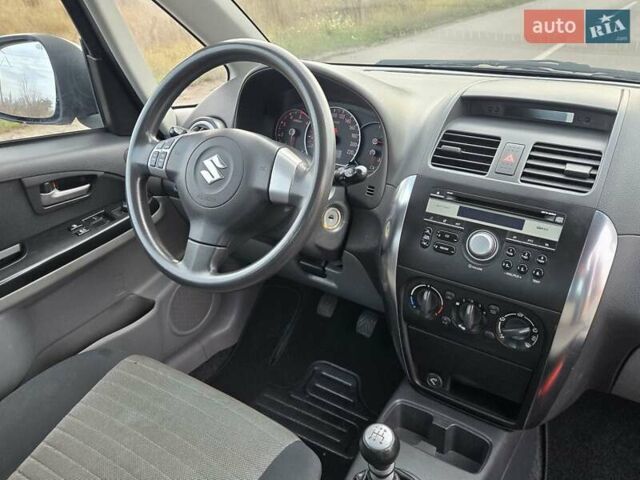 Серый Сузуки СХ4, объемом двигателя 1.6 л и пробегом 175 тыс. км за 5800 $, фото 10 на Automoto.ua