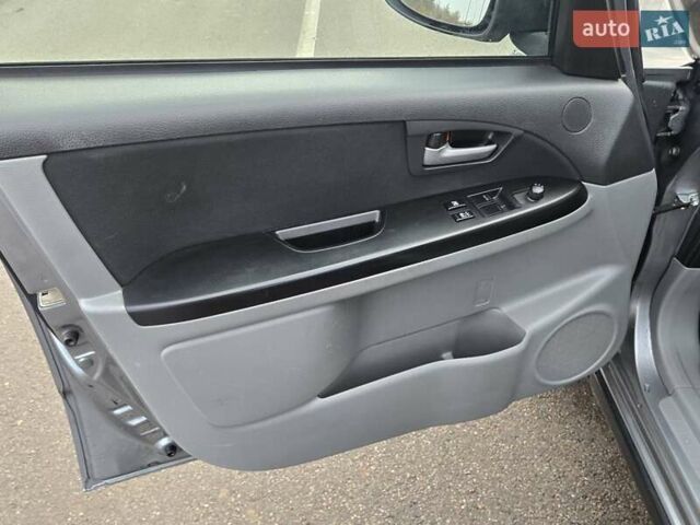 Серый Сузуки СХ4, объемом двигателя 1.6 л и пробегом 175 тыс. км за 5800 $, фото 14 на Automoto.ua