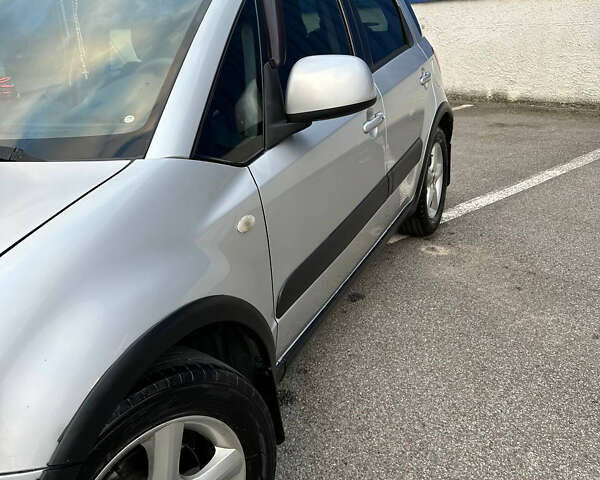 Серый Сузуки СХ4, объемом двигателя 1.59 л и пробегом 234 тыс. км за 7000 $, фото 4 на Automoto.ua