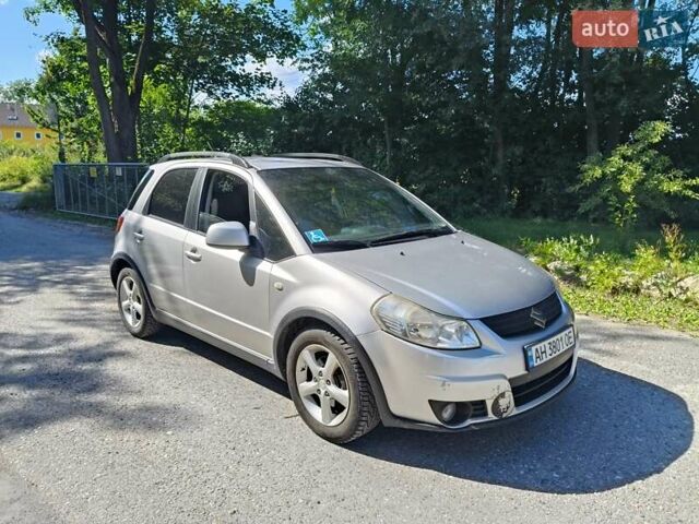 Серый Сузуки СХ4, объемом двигателя 1.6 л и пробегом 233 тыс. км за 5400 $, фото 1 на Automoto.ua