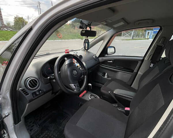 Серый Сузуки СХ4, объемом двигателя 1.59 л и пробегом 234 тыс. км за 7000 $, фото 10 на Automoto.ua