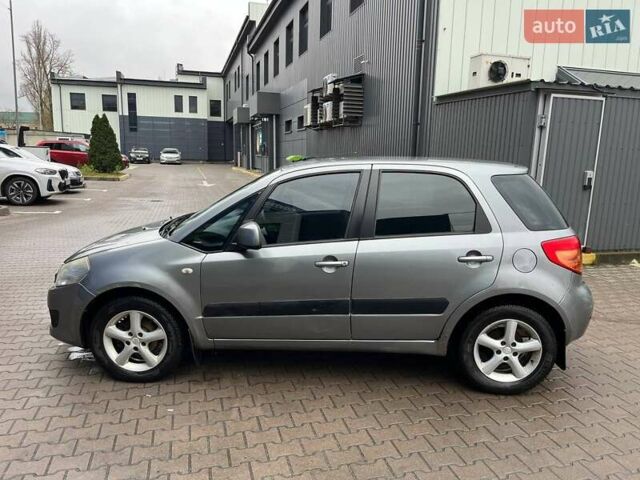 Серый Сузуки СХ4, объемом двигателя 1.6 л и пробегом 148 тыс. км за 5200 $, фото 7 на Automoto.ua