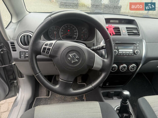 Сірий Сузукі СХ4, об'ємом двигуна 1.59 л та пробігом 280 тис. км за 4999 $, фото 6 на Automoto.ua