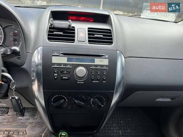 Серый Сузуки СХ4, объемом двигателя 1.6 л и пробегом 148 тыс. км за 5200 $, фото 10 на Automoto.ua