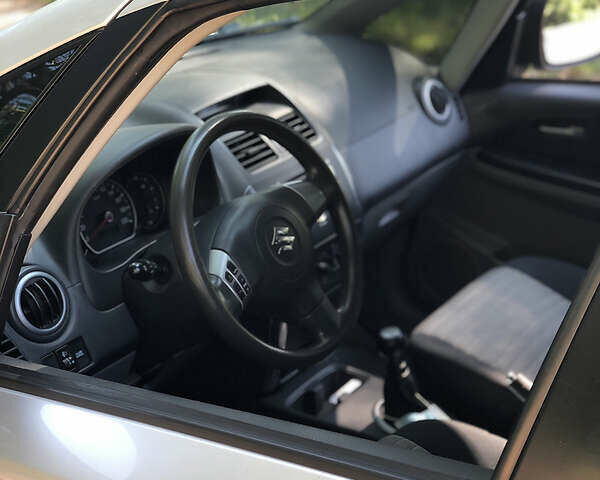 Серый Сузуки СХ4, объемом двигателя 1.6 л и пробегом 126 тыс. км за 6500 $, фото 3 на Automoto.ua