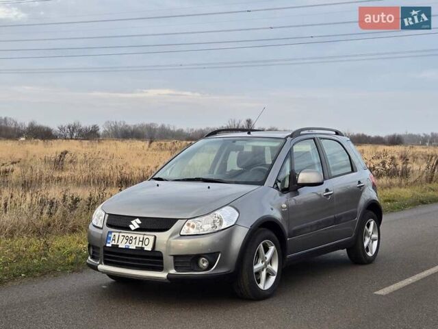 Серый Сузуки СХ4, объемом двигателя 1.6 л и пробегом 175 тыс. км за 5800 $, фото 1 на Automoto.ua