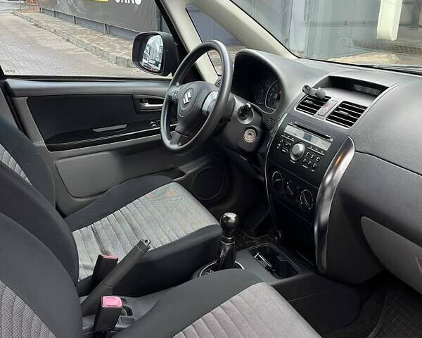 Серый Сузуки СХ4, объемом двигателя 1.6 л и пробегом 148 тыс. км за 5200 $, фото 12 на Automoto.ua