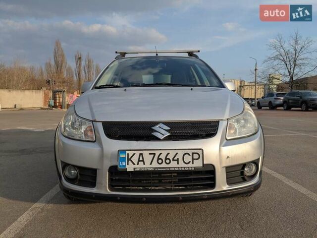 Серый Сузуки СХ4, объемом двигателя 1.6 л и пробегом 326 тыс. км за 6000 $, фото 1 на Automoto.ua