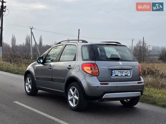 Серый Сузуки СХ4, объемом двигателя 1.6 л и пробегом 175 тыс. км за 5800 $, фото 5 на Automoto.ua