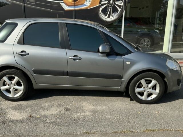Серый Сузуки СХ4, объемом двигателя 1.6 л и пробегом 146 тыс. км за 7750 $, фото 1 на Automoto.ua