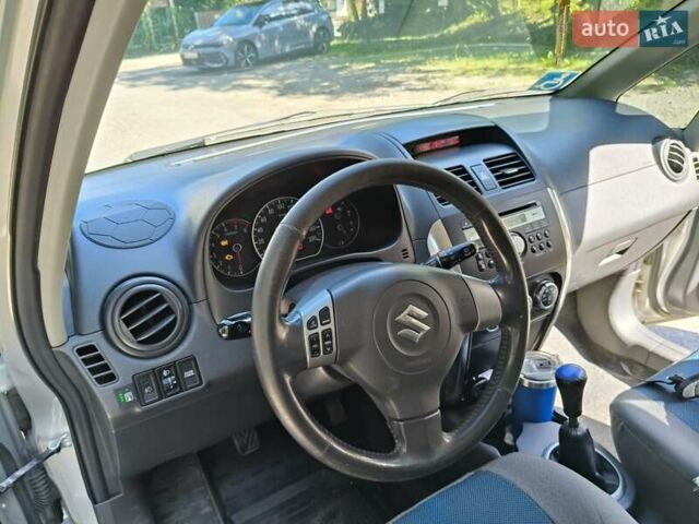 Серый Сузуки СХ4, объемом двигателя 1.6 л и пробегом 233 тыс. км за 5400 $, фото 14 на Automoto.ua