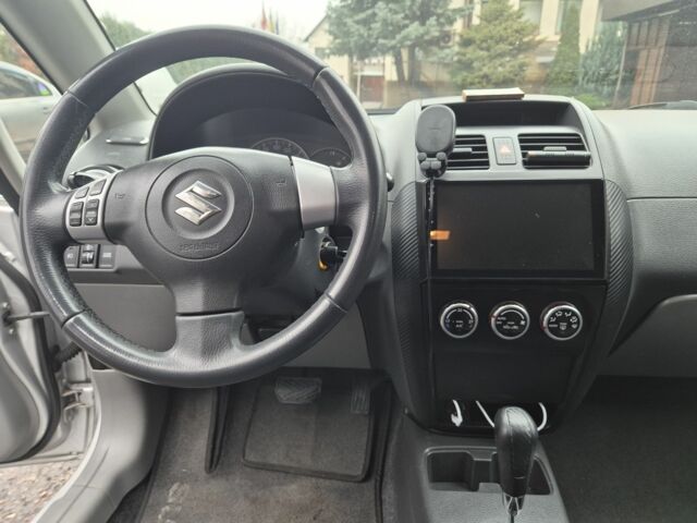 Серый Сузуки СХ4, объемом двигателя 1.6 л и пробегом 214 тыс. км за 6800 $, фото 3 на Automoto.ua