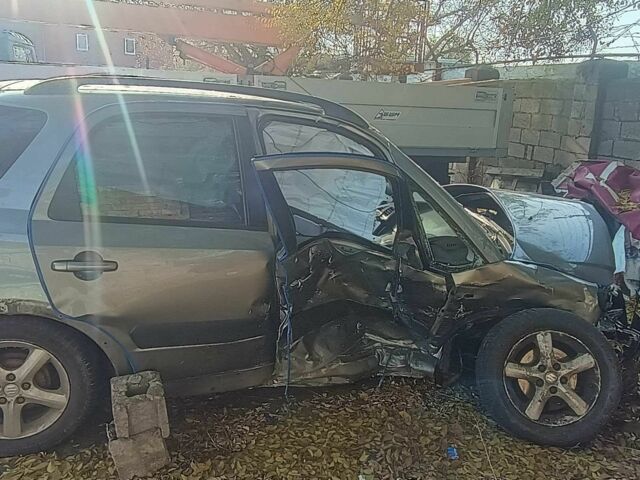 Серый Сузуки СХ4, объемом двигателя 1.6 л и пробегом 200 тыс. км за 1500 $, фото 4 на Automoto.ua