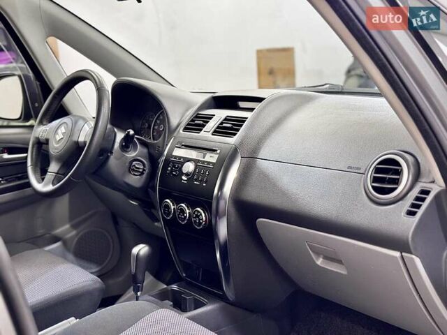 Серый Сузуки СХ4, объемом двигателя 1.6 л и пробегом 133 тыс. км за 7999 $, фото 125 на Automoto.ua