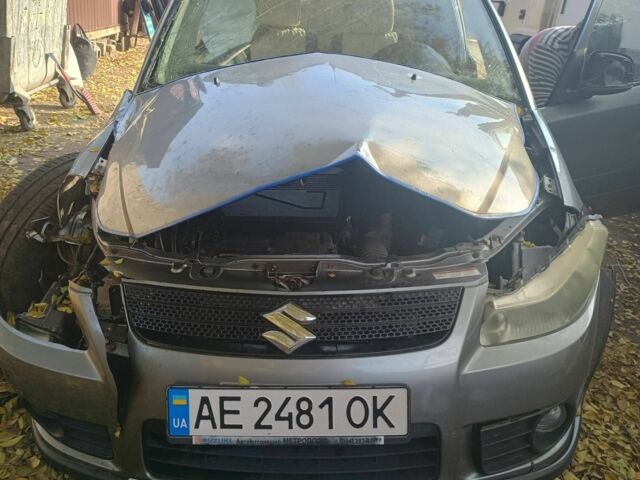 Серый Сузуки СХ4, объемом двигателя 1.6 л и пробегом 200 тыс. км за 1500 $, фото 1 на Automoto.ua