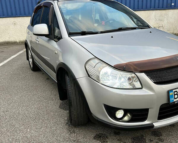 Серый Сузуки СХ4, объемом двигателя 1.59 л и пробегом 234 тыс. км за 7000 $, фото 1 на Automoto.ua