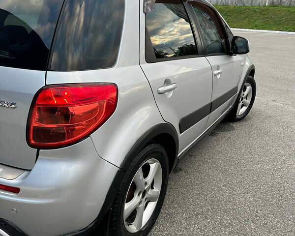 Серый Сузуки СХ4, объемом двигателя 1.59 л и пробегом 234 тыс. км за 7000 $, фото 5 на Automoto.ua