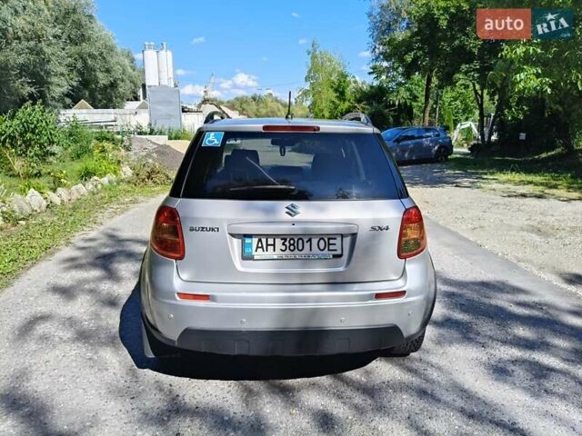 Серый Сузуки СХ4, объемом двигателя 1.6 л и пробегом 233 тыс. км за 5400 $, фото 4 на Automoto.ua