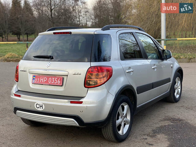 Серый Сузуки СХ4, объемом двигателя 1.6 л и пробегом 210 тыс. км за 7399 $, фото 3 на Automoto.ua