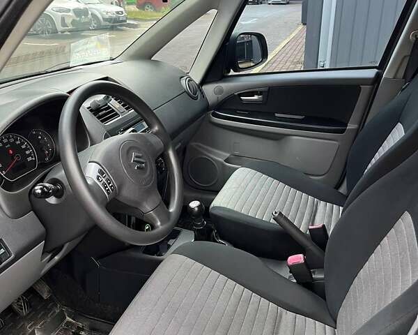 Серый Сузуки СХ4, объемом двигателя 1.6 л и пробегом 148 тыс. км за 5200 $, фото 8 на Automoto.ua