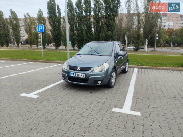 Серый Сузуки СХ4, объемом двигателя 1.59 л и пробегом 232 тыс. км за 6100 $, фото 13 на Automoto.ua