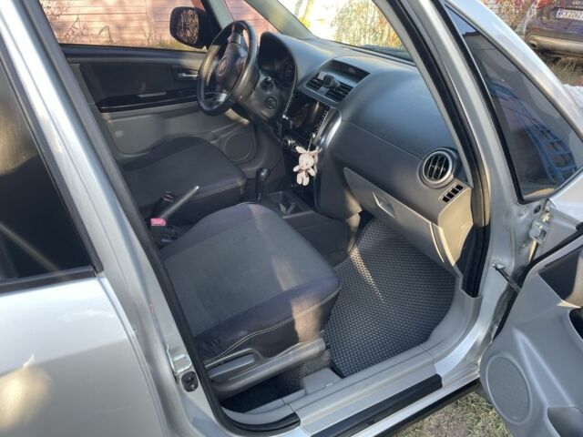 Серый Сузуки СХ4, объемом двигателя 1.6 л и пробегом 212 тыс. км за 7000 $, фото 8 на Automoto.ua