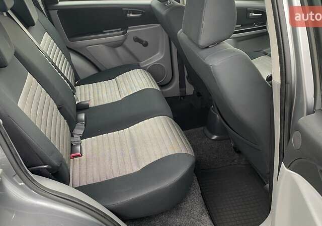 Серый Сузуки СХ4, объемом двигателя 1.6 л и пробегом 181 тыс. км за 6899 $, фото 6 на Automoto.ua