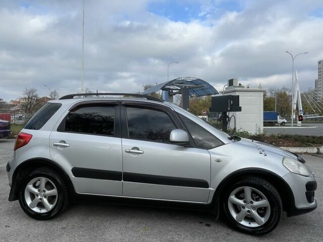 Серый Сузуки СХ4, объемом двигателя 1.6 л и пробегом 212 тыс. км за 7000 $, фото 2 на Automoto.ua