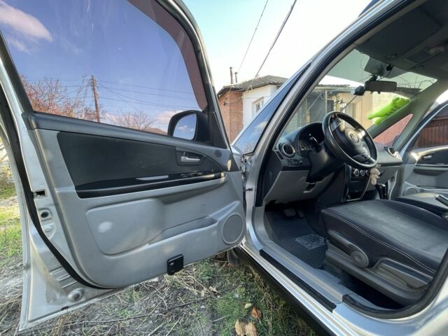 Серый Сузуки СХ4, объемом двигателя 1.6 л и пробегом 212 тыс. км за 7000 $, фото 10 на Automoto.ua