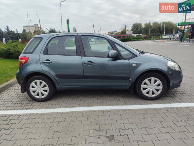 Серый Сузуки СХ4, объемом двигателя 1.59 л и пробегом 232 тыс. км за 6100 $, фото 5 на Automoto.ua