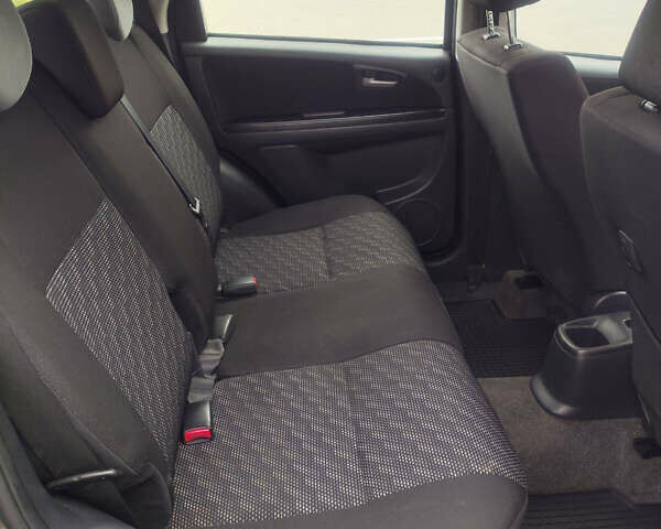 Серый Сузуки СХ4, объемом двигателя 1.59 л и пробегом 232 тыс. км за 6100 $, фото 7 на Automoto.ua