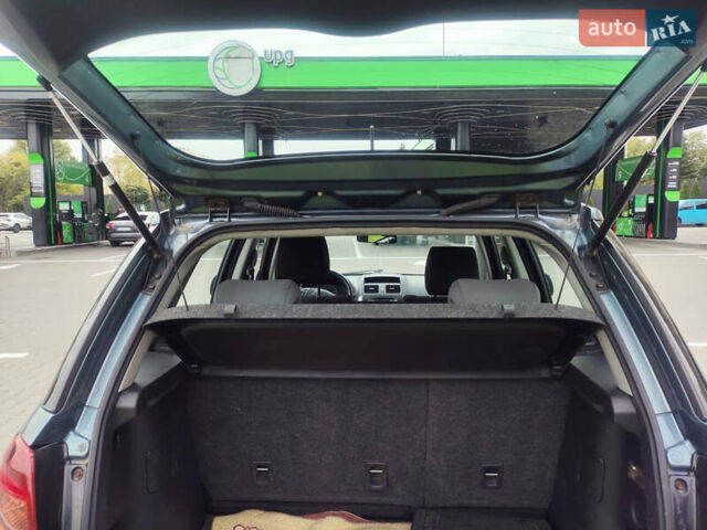 Серый Сузуки СХ4, объемом двигателя 1.59 л и пробегом 232 тыс. км за 6100 $, фото 6 на Automoto.ua