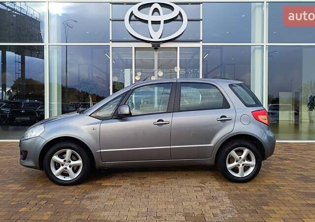 Серый Сузуки СХ4, объемом двигателя 1.6 л и пробегом 181 тыс. км за 6899 $, фото 2 на Automoto.ua