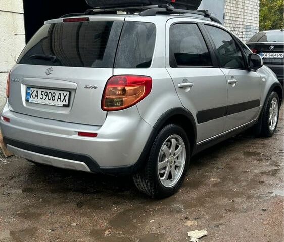 Серый Сузуки СХ4, объемом двигателя 1.6 л и пробегом 243 тыс. км за 7000 $, фото 2 на Automoto.ua